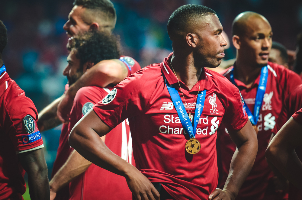 footballer daniel sturridge with other with other liverpool fc players