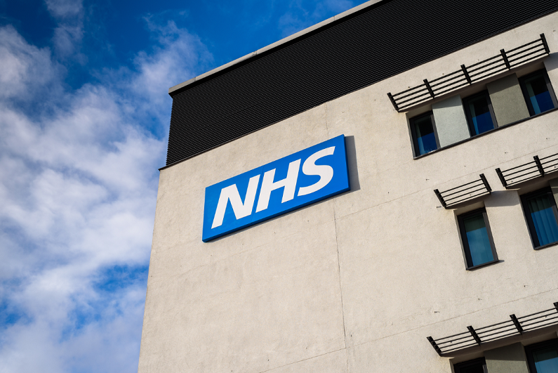 NHS logo on a building