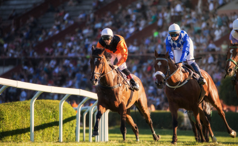 Two jockeys during horse race