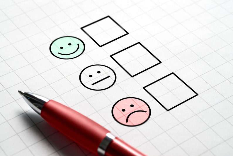 Checkbox survey using a happy, neutral, sad face scale