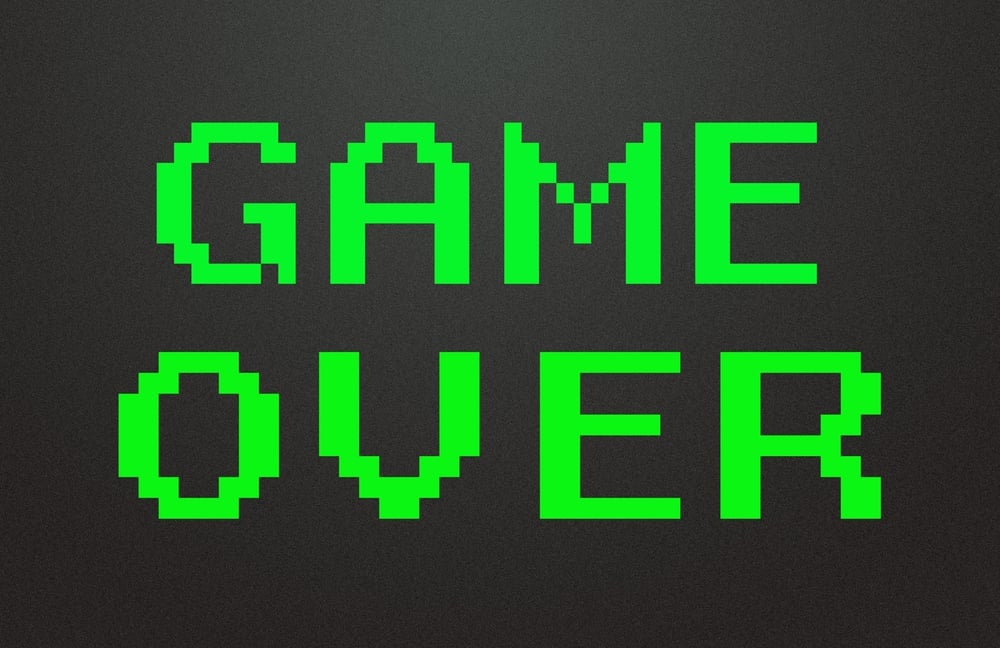 Game Over words in green on black screen