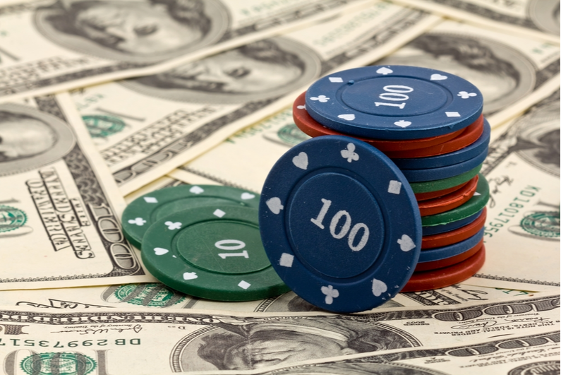 Poker chips and dollars