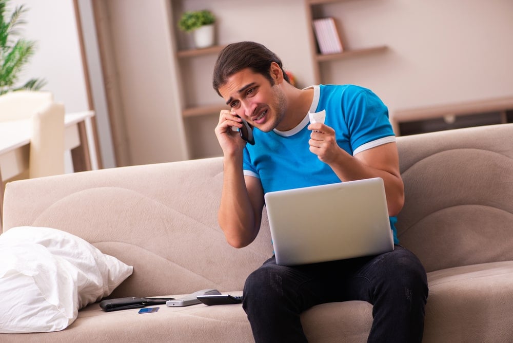 man complaining while on the phone